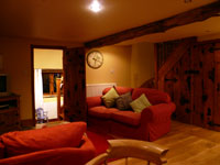 Pudding Pie Barn, Wigley, Nr. Baslow, Derbyshire -  Lounge with Door to Downstairs Bedroom